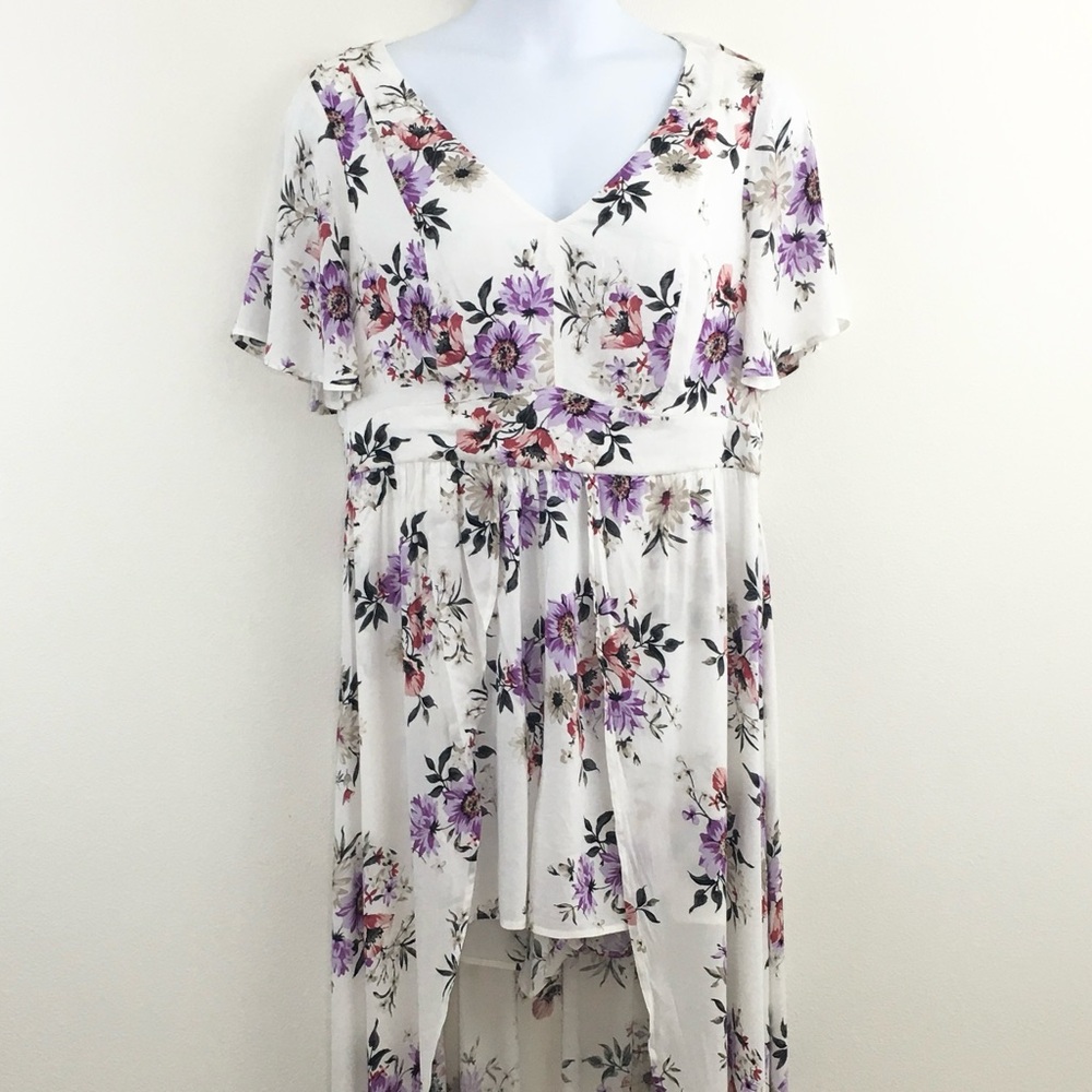Torrid | Floral Shorts Romper with Open Front Skirt - Picture 6 of 9